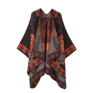 Close-up view of the intricate geometric pattern and ethnic design on the warm women cape.