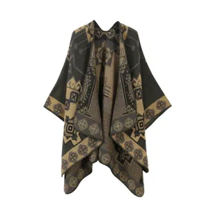 Close-up detail of the classic geometric color-block pattern women shawl cape knitwear fabric.