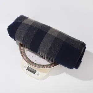Women's plaid tassel winter warm shawl wrap, cozy fashion cape scarf detail weight view.