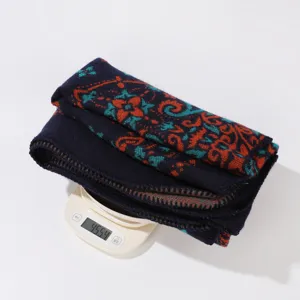 Women knit double-sided warm shawl blanket, stylish patterned winter wrap for daily cozy wear.
