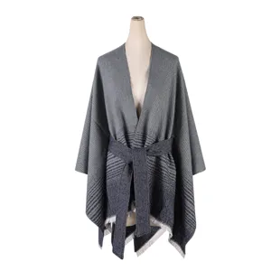 Detailed view of the women knitted striped shawl cape with matching belt, elegant gradient grey design.