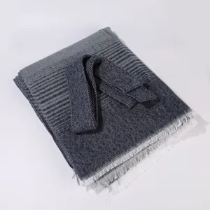 Detailed view of women striped poncho cape with belt and fringe hem stylish design winter fashion