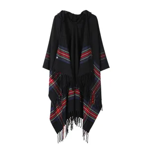 Black hooded poncho detail, featuring colorful striped plaid patterns and fringe trim hem.