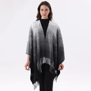 Elegant black and white gradient knitted shawl with stylish fringe hem for women wear.
