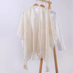 Women summer knit hollow out tassel shawl cardigan, lightweight elegant beach outerwear.