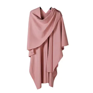 Chic knitted wrap shawl with elegant split design, soft core-spun yarn texture for cozy winter style.