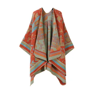 Orangefarbenes vintage geometrisches Strickponcho Cape Detailansicht Modeausschnitt