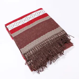 Close-up of women's color-blocked tassel shawl fringe detail, soft imitation cashmere.