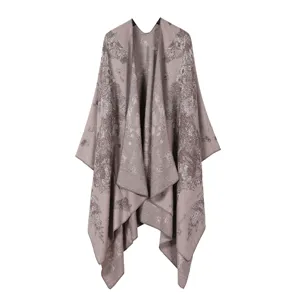 Detailed view of the vintage horse pattern knitted cape, showing exquisite jacquard texture.