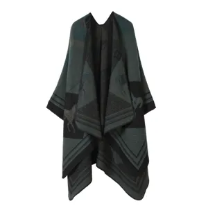 Knitted shawl cape with retro horse and geometric pattern for warmth and autumn style.