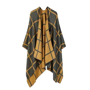 Detailed view of the cozy grey and yellow plaid open front cape shawl for autumn season.