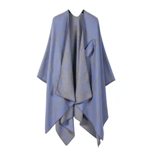 Blue and grey plaid open-front cape detail, stylish cozy autumn winter warmth poncho shawl.