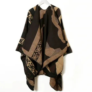 Knitted imitation cashmere shawl detail showing the cozy geometric patterned texture and drape.