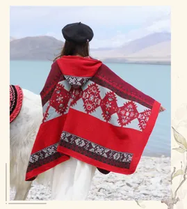 Detailed shot of ethnic retro warm hooded poncho shawl, perfect for winter travel and outdoor wear.