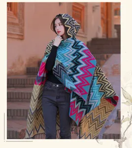 Women's autumn winter ethnic retro hooded warm shawl cape with colorful zigzag pattern.