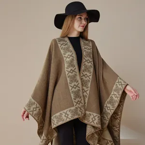Details of the women's winter warm imitation cashmere shawl cape with ethnic border design.