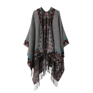 Bohemian ethnic style knit poncho cape with geometric pattern and fringe hem for women.