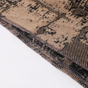 Detaillierte Strickgewebe Textur des warmen Damen Vintage gemusterten Schals Umhang.