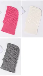Close-up view of the knitted cable balaclava hood detail, showing fine texture and soft fabric.