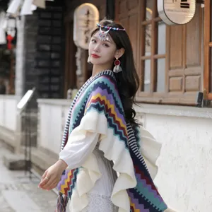 Boho ethnic knitted shawl for women, colorful geometric fringe cape for autumn and winter travel.