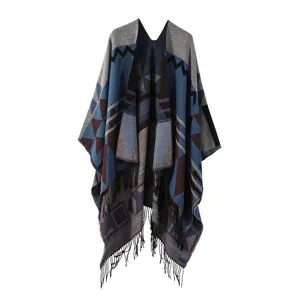 Detailed view of women's autumn winter tassel geometric pattern cozy warm imitation cashmere cape shawl.
