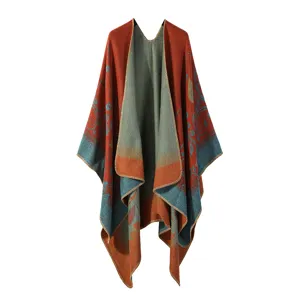 Detailed view of the autumn winter retro ethnic knit shawl cape with beautiful vintage floral print.