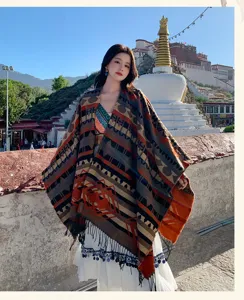 Ethnic style fringe tassel cape poncho detail scenic outdoor tourism fashion outfit warm shawl.