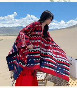Retro ethnic geometric pattern tassel poncho shawl, cozy fleece wrap for winter travel and outdoor.