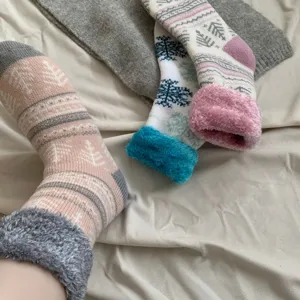 Cozy winter fleece-lined thick mid-tube socks with Nordic pattern and plush cuffs for warmth.