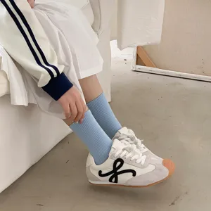 Comfortable candy color ribbed mid-calf socks for women and men, spring casual style.