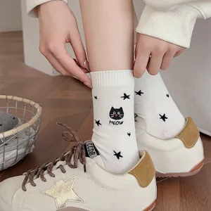 Cotton mid-tube women socks featuring cute black cat embroidery and star pattern design.
