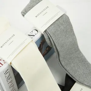 Solid color ribbed knee high socks for women, casual long cotton socks for spring and autumn.