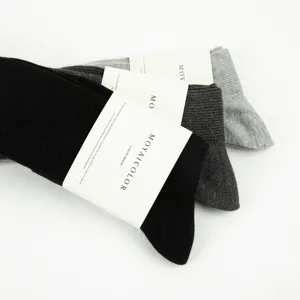 Solid color ribbed long socks detail view, cozy cotton blend knee high socks for women.
