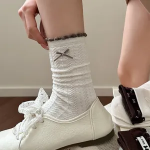 Women's mid-calf cute bow knit slouch socks with ruffled edge for daily wear and fashion outfit.