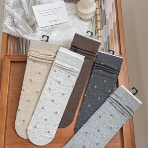 Detailed view of floral cotton stacking socks with delicate print and soft texture.