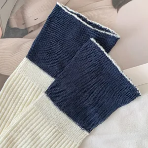 Women's contrast color slouchy socks, ribbed knit creamy white foldable mid-calf winter socks.