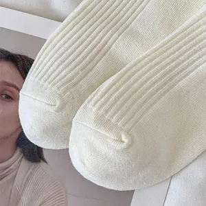 Cream ribbed slouch socks for women, cozy winter cotton knit mid tube casual socks.