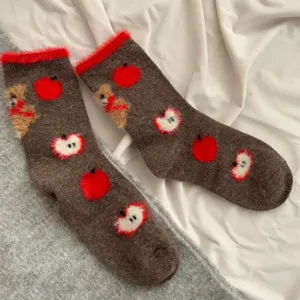 Brown fuzzy winter socks featuring cute teddy bear and red apple plush prints, warm long crew socks.