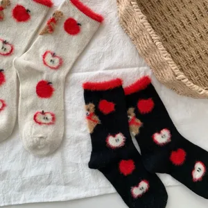 Cute fuzzy apple bear mid-calf socks detail, cozy winter sock features, soft daily wear.