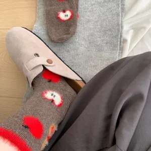 Cozy brown mid-calf socks featuring cute red flocked apple patterns for autumn winter.