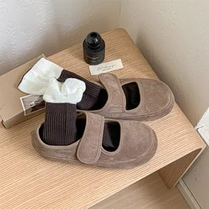 Winter contrast color stacked socks and brown retro shoes set, comfortable and stylish daily wear.