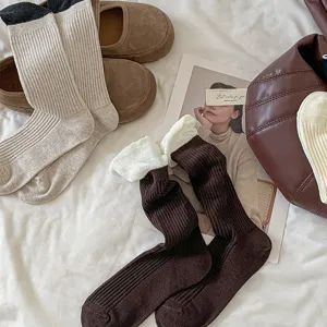 Cozy brown and cream cotton slouch socks with contrast foldover cuffs for women daily wear.