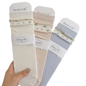 Women's cute floral long socks with ruffled cuffs, sweet stacked style, comfortable fit.