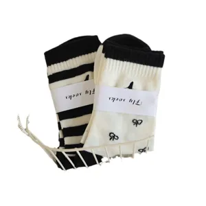 Cozy mid-tube socks with cute stripe and embroidery designs, perfect for autumn and winter.