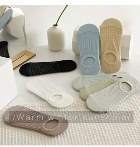 Candy color invisible boat socks detailed showcase in cozy home setting, soft cotton material.