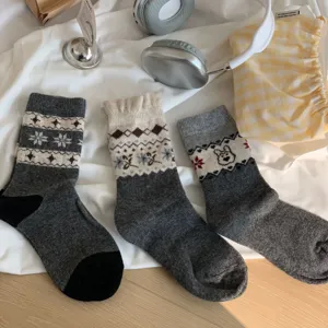 Cozy winter mid-calf knit socks featuring classic Fair Isle patterns, thick warm wool blend for cold days.