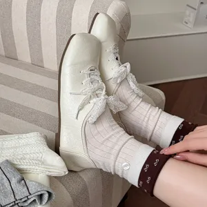 Women lace ruffle stackable mid tube socks with casual shoes detail shot cozy daily wear