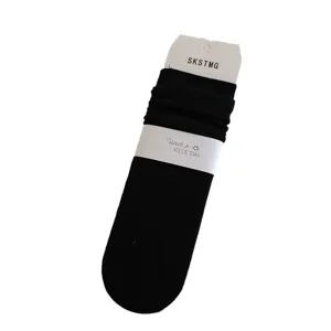 Autumn winter solid color slouch socks women vertical striped knitted cotton mid-tube socks.