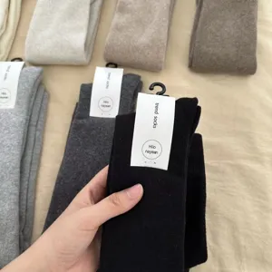 Thickened over-the-knee fleece socks for women, winter warm thigh high cotton long socks.