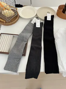 High elasticity solid color over-the-knee socks, super soft compact spun cotton details.